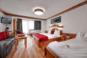 Quadruple Room with Balcony room in Hotel Hubertushof
