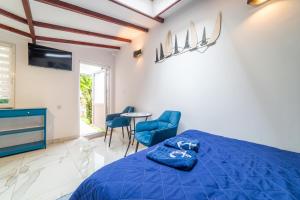 Pokoje Żeglarza przy promenadzie, Mikołajki