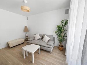 Appartements Appartement lumineux et moderne, proche transports : photos des chambres