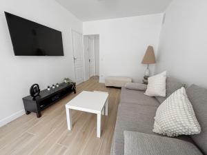 Appartements Appartement lumineux et moderne, proche transports : photos des chambres