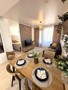 Luhtitalon päätyhuoneisto saunalla - Liinavaatteet,pyyhkeet ja loppusiivous sisältyvät aina majoituksen hintaan