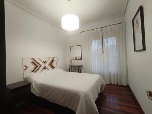 Piso con terraza y zonas verdes