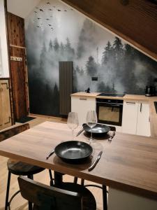 Appartements Appartement neuf Le Grenier d-Oscar : photos des chambres