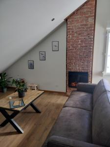 Appartements Appartement neuf Le Grenier d-Oscar : photos des chambres