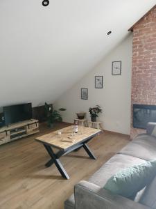 Appartements Appartement neuf Le Grenier d-Oscar : photos des chambres