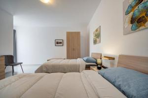 Brand-New Stylish Seaside Escape in Qawra, Steps from the Sea