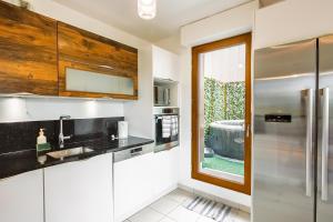 Appartements Le petit sesame jacuzzi cosy Stade De France 6 personnes Wifi Terrasse Parking prive : photos des chambres