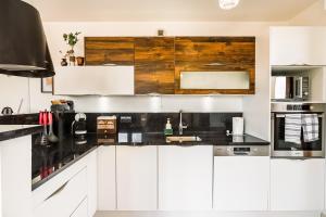 Appartements Le petit sesame jacuzzi cosy Stade De France 6 personnes Wifi Terrasse Parking prive : photos des chambres