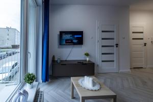 Sea Breeze Apartment by FengShui4u, balkon, nowy budynek, dostęp na kod