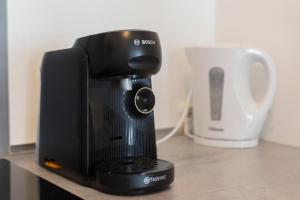 Appartements Le Familial - Spacieux - 8p - 10 min Disney : photos des chambres