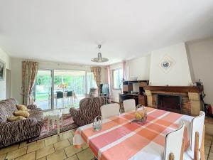 Appartements Charmante maison avec jardin : photos des chambres