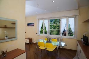 Appartamento Familiare con Vista Lago e Giardino - Via Valassina 8