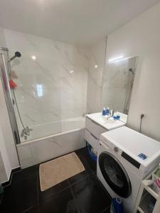 Appartements Nid douillet equipe a Saint-Ouen : photos des chambres