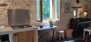 Maisons de vacances Grange avec piscine - La Hulotte du Cluzel : photos des chambres