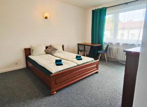 TK Apartamenty I Pokoje