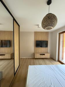 Czyżyk - Apartamenty Rydzewo