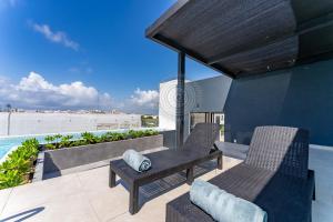 Brand new condo with Pool Steps to Beach and 5th