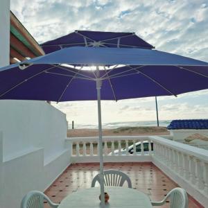 Maison de plage pied dans leau pour familles
