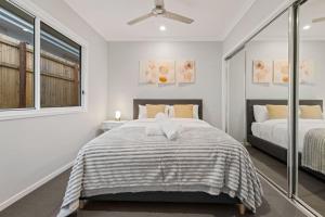 Modern 4BR Home Peaceful Logan Reserve Stay