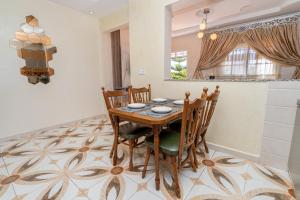 Magnifique appartement avec jardin en face de la mer