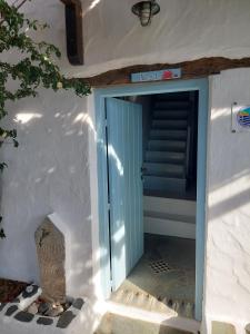 Avra traditional Blue house, Elmas Houses