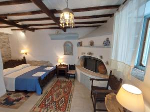 Avra traditional Blue house, Elmas Houses