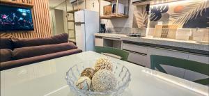 Flat Aconchegante, 100m da praia, piscina, sauna