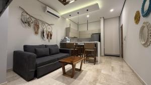 1BR con entrada gratuita club de playa hábitas