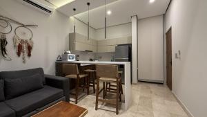 1BR con entrada gratuita club de playa hábitas