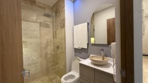 1BR con entrada gratuita club de playa hábitas