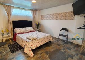 San Carlos Apartaestudio céntrico con cocina en Choachí