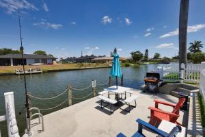 Luxury Waterfront Vacation Home with Dock and free heated Pool