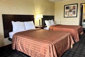 Double Room with Two Double Beds - Non-Smoking room in Travelodge by Wyndham Seymour