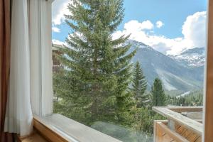 Casa Cresta C32, Zentrales Apartment mit Bergblick by Arosa Vacations