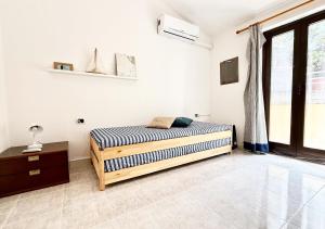 Pgs Immobiliare srls Bellavista Maria Attico con vista mare e parcheggio privato La Maddalena