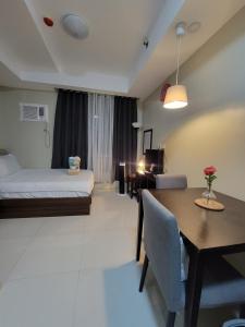 Cozy Condo near BGC and Ortigas with free Gym & Pool