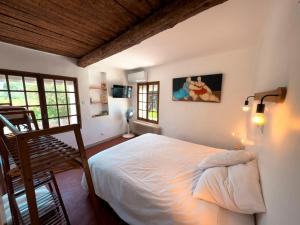 Sejours chez l'habitant Gite T2 a 5mn du Circuit Paul Ricard et du village du Castellet et a 10mn des plages de Saint-Cyr-sur-mer, Bandol et Sanary : photos des chambres