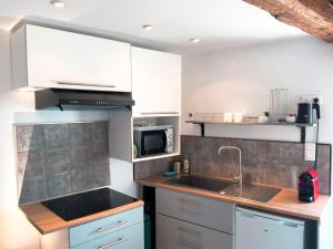 Sejours chez l'habitant Gite T2 a 5mn du Circuit Paul Ricard et du village du Castellet et a 10mn des plages de Saint-Cyr-sur-mer, Bandol et Sanary : photos des chambres