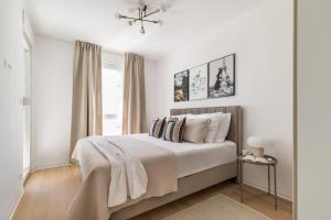 Boutique Soft Tones with Balcony and Secured Garage