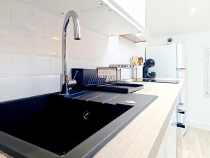 Appartements Appartement Cosy en plein coeur du village : photos des chambres