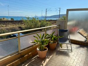 JUAN - PLAGES - PARKING Privé - TERRASSE VUE MER