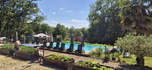 B&B / Chambres d'hotes gite le nieudegat chambre et table d'hote piscine climatisation proche de Sarlat au coeur de la nature : photos des chambres