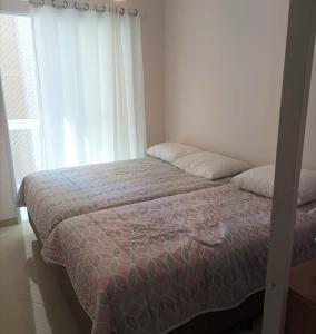 Apartamento em condomínio frente pra praia