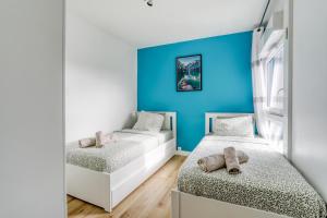 Appartements Large-Paris, CDG, Villepinte Expo, Disney, Asterix : photos des chambres