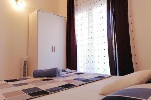 Apartments by the sea Pirovac, Sibenik - 24368