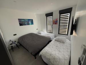 Maisons de vacances Villa Chipie neuve & grand standing ! : photos des chambres