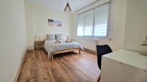 Appartements Caprices des vagues - A 300 m de la plage et a 4 kilometres de Nausicaa, Place de parking privee, Eau douce, Netflix, Primes Video, Wifi haut debit : photos des chambres