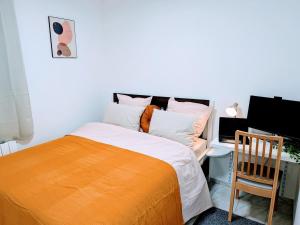 Appartements T3 de standing - Porte de Paris - Stade de France : photos des chambres
