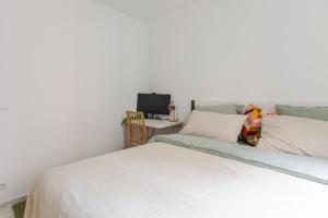 Appartements T3 de standing - Porte de Paris - Stade de France : photos des chambres