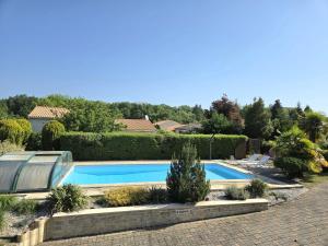 Maisons de vacances Evasion en Ville : Maison avec Piscine Privee : photos des chambres